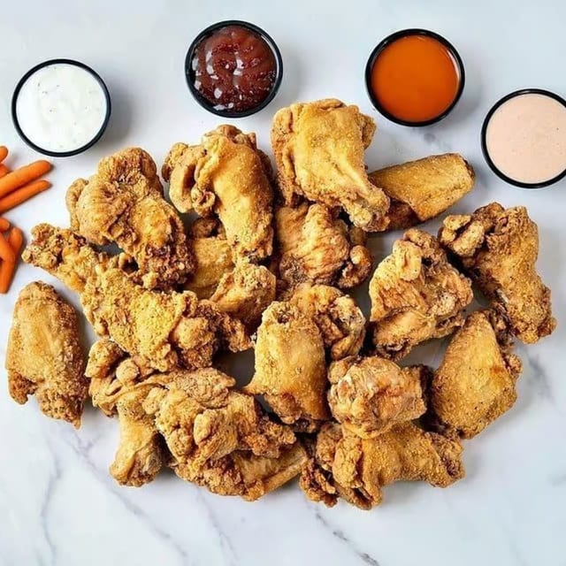 24 Jumbo Boneless or Classic Wings.