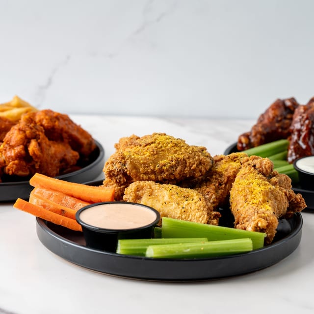 10 Jumbo Boneless or Classic Wings.